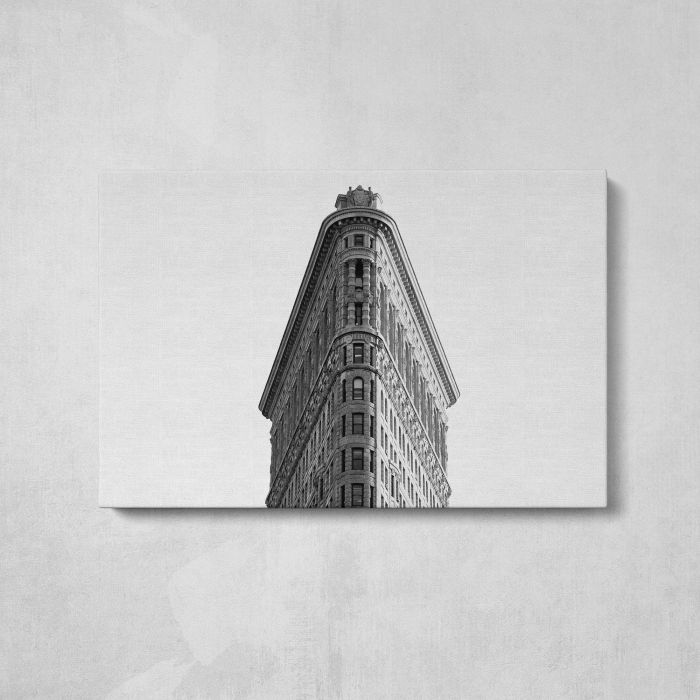 Black and white photo looking up at the Flatiron Building in New York City canvas print, front canvas view
