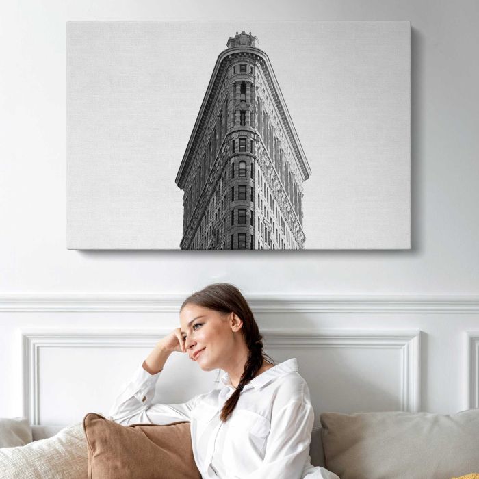 Black and white photo looking up at the Flatiron Building in New York City canvas print, interior display view