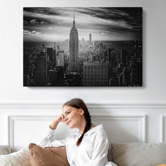 Black and white photo of the Empire State Building and downtown New York City canvas print, interior display view