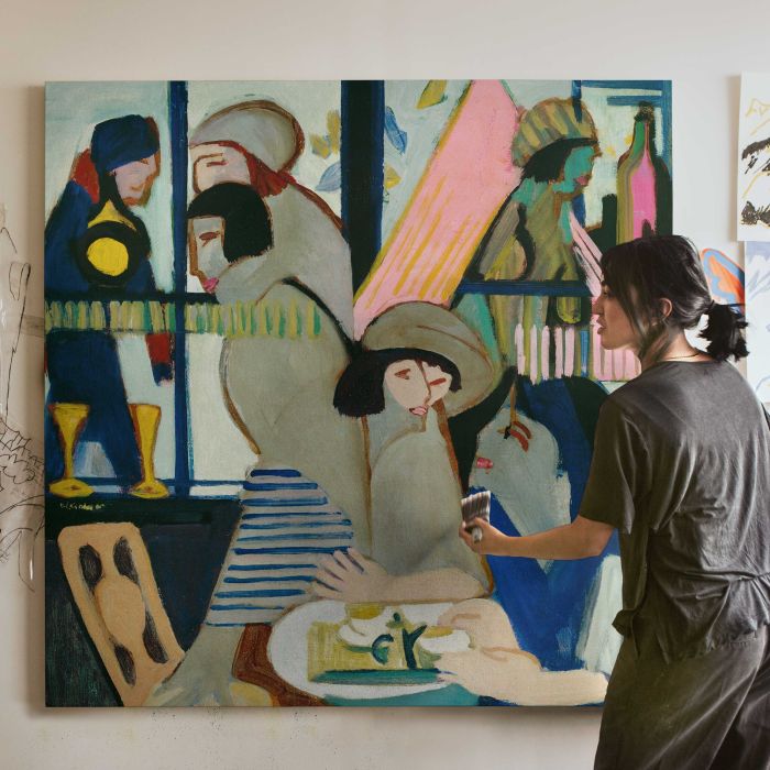 Cafe (1928) by Ernst Ludwig Kirchner canvas print, canvas shown with a person for scale