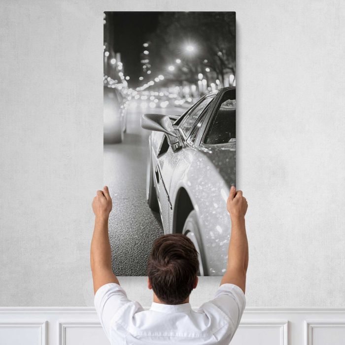 Car beneath City Lights canvas print, tall canvas held against a wall