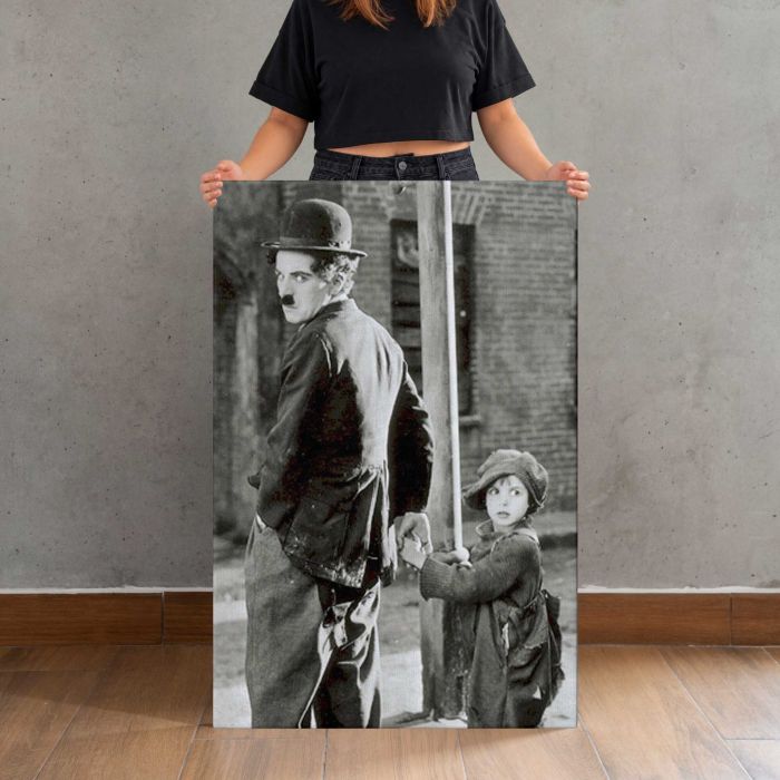 Charlie Chaplin & Jackie Coogan canvas print, canvas shown with a person for scale
