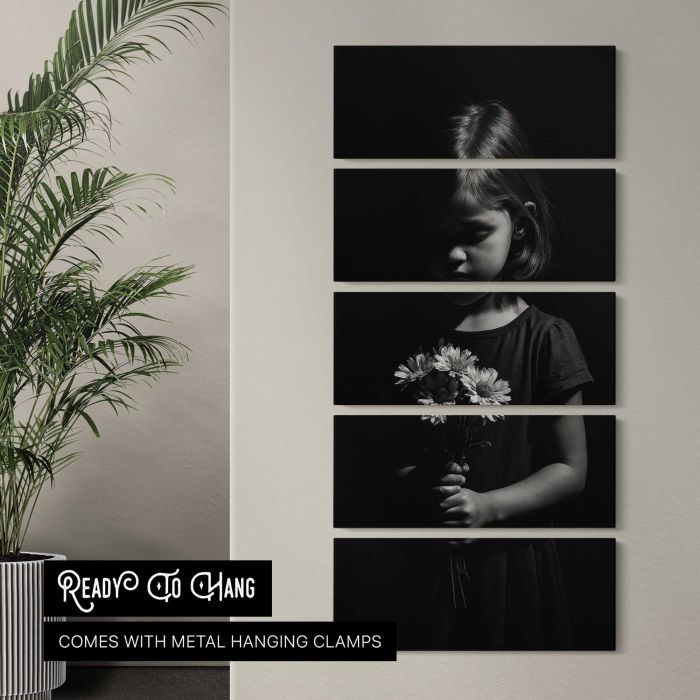 Child holding flowers in darkness canvas print, interior display view