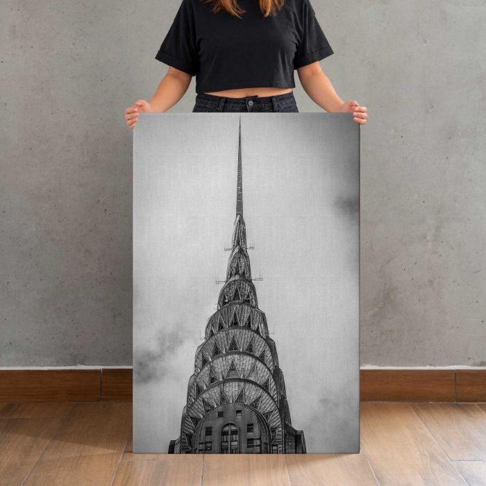 Chrysler Building in Black and White canvas print, canvas shown with a person for scale
