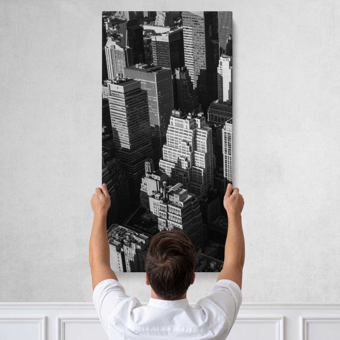 City Blocks in Black and White canvas print, tall canvas held against a wall