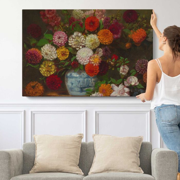 Dahlias in a Blue and White Jar by Eugène Delacroix canvas print, canvas shown with a person for scale