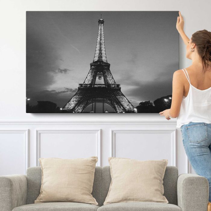 Eiffel Tower, Paris in Black and White canvas print, canvas shown with a person for scale