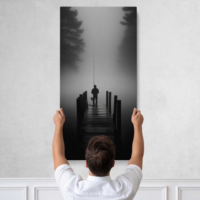 Fisherman on a Dock in Silhouette canvas print, tall canvas held against a wall
