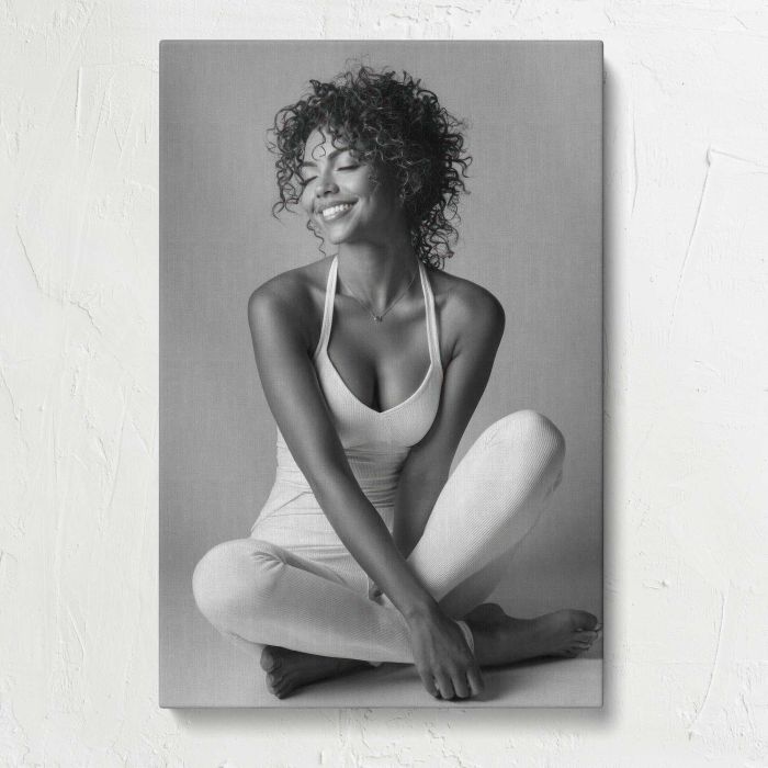 Joyful Woman in a Seated Pose canvas print, front canvas view