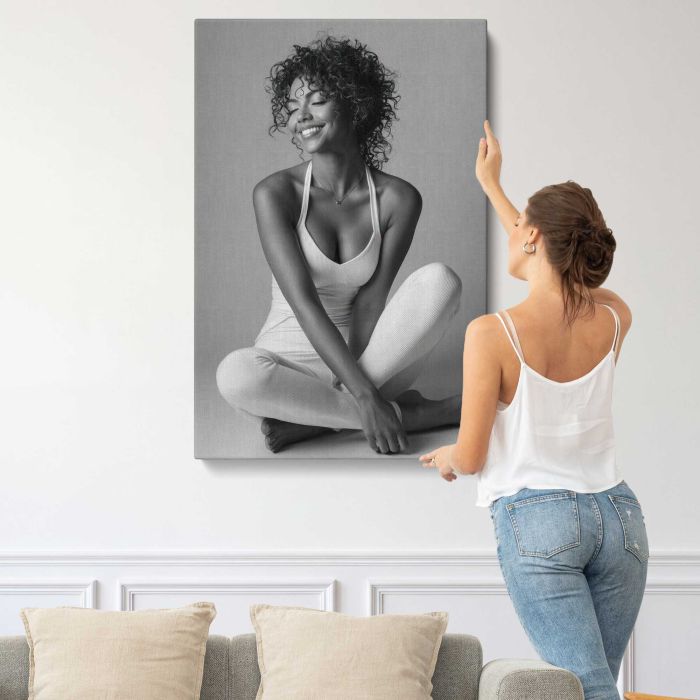 Joyful Woman in a Seated Pose canvas print, interior display view