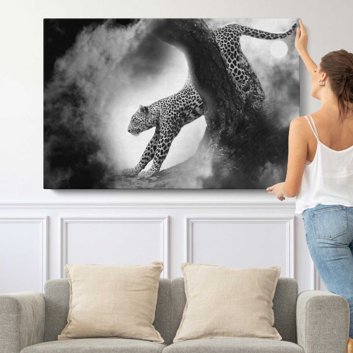 Leopard in Black and White canvas print, canvas shown with a person for scale
