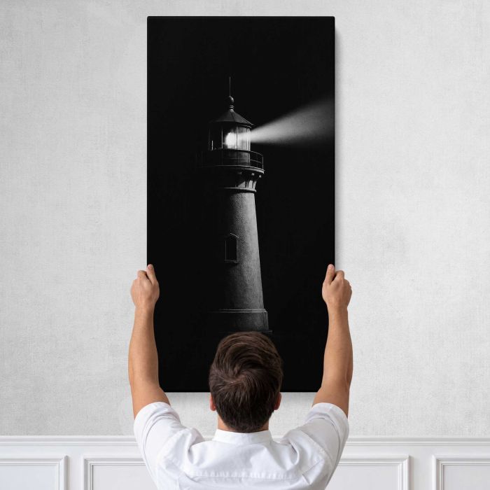 Lighthouse guiding through darkness canvas print, tall canvas held against a wall
