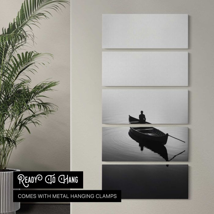 Man Fishing from a Rowboat in Monochrome canvas print, interior display view