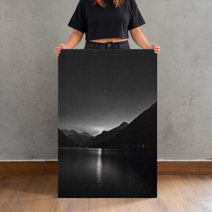 Monochrome Mountain Lake at Night canvas print, canvas shown with a person for scale