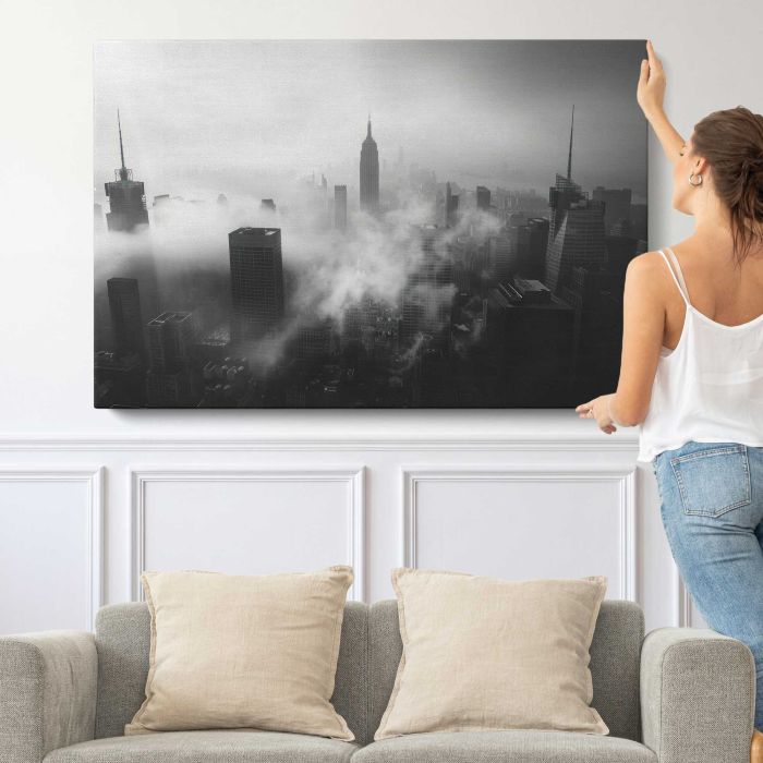 New York City Skyline canvas print, canvas shown with a person for scale