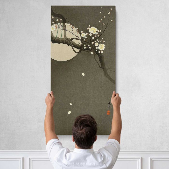 Plum before the Moon by Ohara Koson canvas print, tall canvas held against a wall