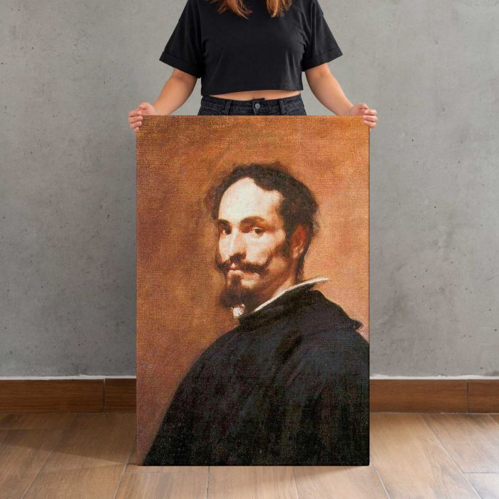 Portrait of a Man by Diego Velázquez canvas print, canvas shown with a person for scale