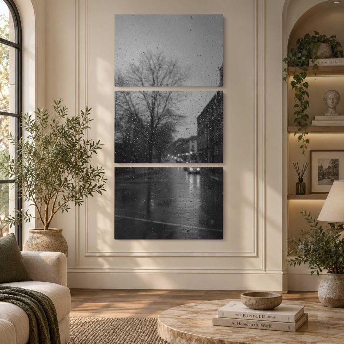 Rainy city street through window droplets, moody monochrome canvas print, interior display view