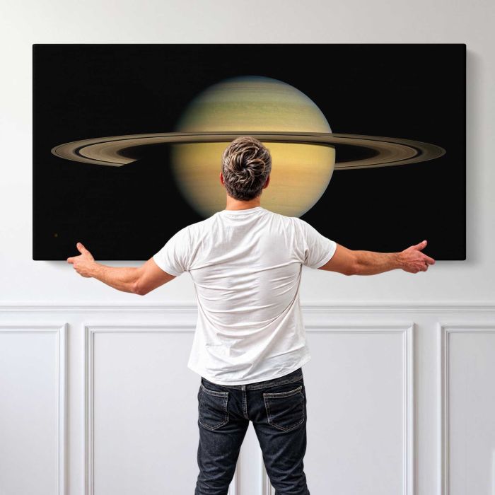 Saturn canvas print, canvas shown with a person for scale