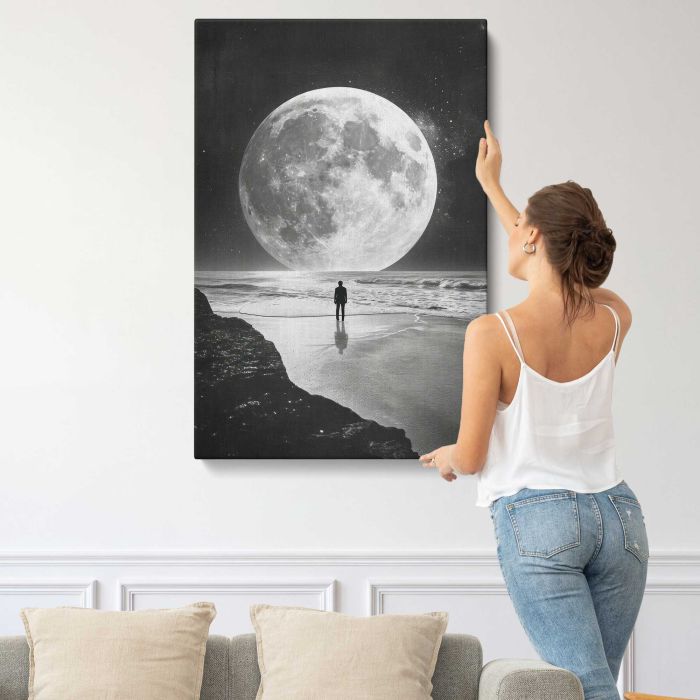 Silhouette beneath a Galaxy Sky canvas print, interior display view