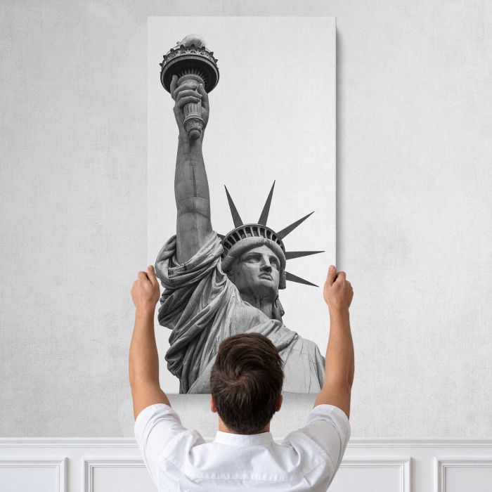 Statue of Liberty Close-Up in Black and White canvas print, tall canvas held against a wall