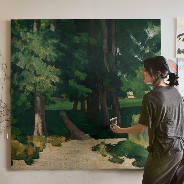 The Avenue at the Jas de Bouffan (1869) by Paul Cézanne canvas print, canvas shown with a person for scale