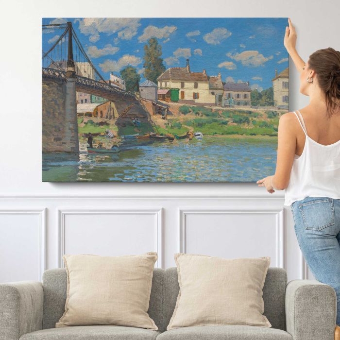 The Bridge at Villeneuve-la-Garenne by Alfred Sisley canvas print, canvas shown with a person for scale