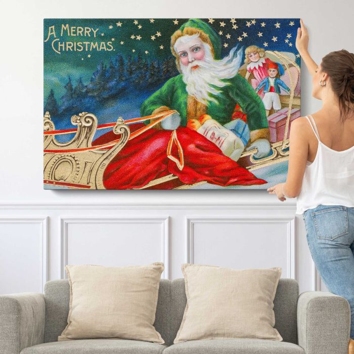 Vintage Christmas Postcard canvas print, canvas shown with a person for scale