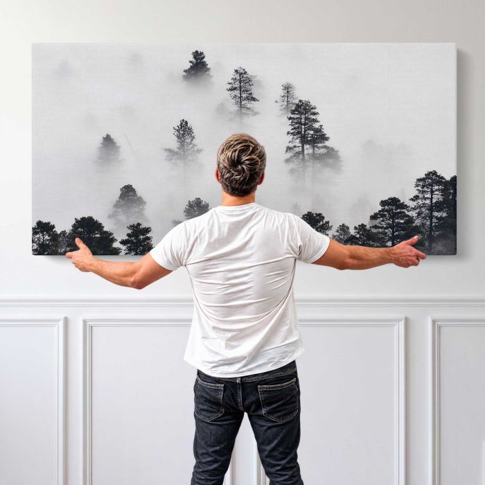Winter Landscape in Monochrome canvas print, canvas shown with a person for scale