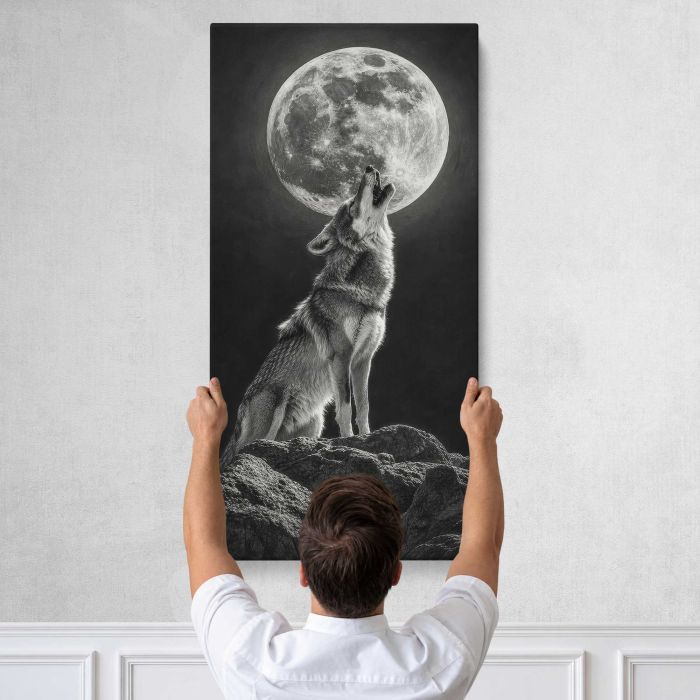 Wolf Howling at a Full Moon canvas print, tall canvas held against a wall