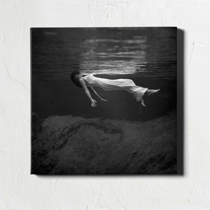 Woman in a Long Gown Floating Underwater canvas print, front canvas view