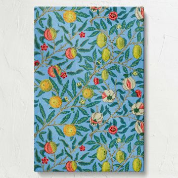 Beautiful canvas wall art with William Morris Four Fruits design featuring bold citrus fruits, pomegranates, and floral motifs on a blue background, crafted to elevate home or office decor with classic Arts and Crafts movement-inspired charm.