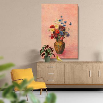 Rustic-inspired wall art print depicting a charming still life of blooming flowers in a golden vase, including red, yellow, and blue flowers, set against a soft pink backdrop, creating a harmonious and vibrant addition to any home or office space.