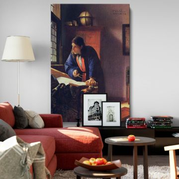 Classic canvas print of The Geographer by Vermeer depicting a thoughtful scholar leaning over a map with a compass, surrounded by symbolic objects like a globe and books, with soft natural light enhancing the rich textures of the scene.