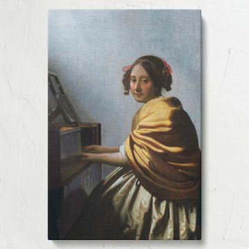 Artistic wall canvas of A Young Woman Seated at the Virginals by Vermeer showing a woman seated at a virginal, her golden dress and serene expression illuminated by natural light, with a simple blue-gray background adding elegance to the scene.