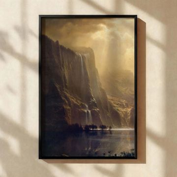 This magnificent canvas print of Among the Sierra Nevada, California by Albert Bierstadt presents a dramatic scene of rugged mountain peaks and flowing waterfalls bathed in soft golden light. The reflective waters of the lake create a peaceful contrast wi