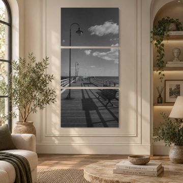Black and white empty seaside pier with benches and lamps canvas print, interior display view