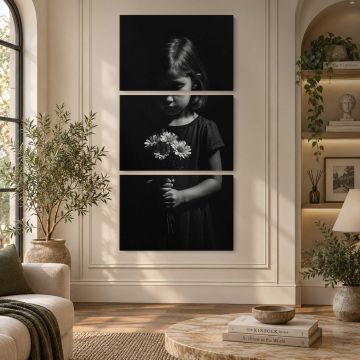 Child holding flowers in darkness canvas print, interior display view