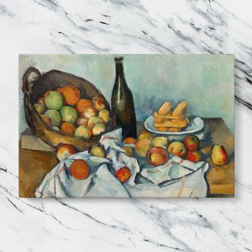 The Basket of Apples canvas artwork displayed on a marble background