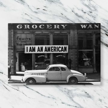 I Am an American Vintage Street Photograph canvas artwork displayed on a marble background