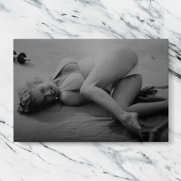 Marilyn Monroe Reclining Black and White Portrait canvas artwork displayed on a marble background