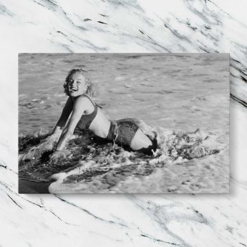 Marilyn Monroe at the Beach canvas artwork displayed on a marble background