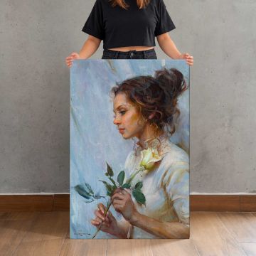 A Gift of White Roses by Daniel Gerhartz canvas print, held for scale