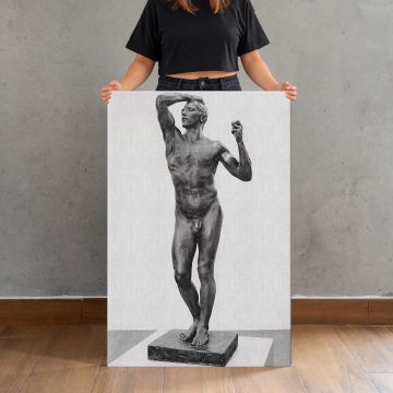 The age of bronze BW by Auguste Rodin canvas print, held for scale