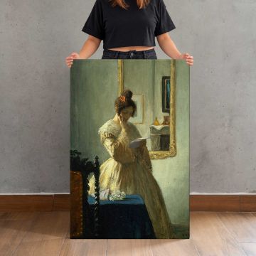 The Letter canvas print, held for scale