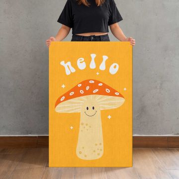 Hello Smiling Mushroom on Orange canvas print, held for scale