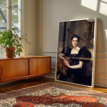 Portrait canvas print of Elizabeth Winthrop Chanler by John Singer Sargent showing a composed woman with elegant posture, dressed in black with minimal jewelry and neatly styled dark hair. She is seated in a plush, shadowy room adorned with classical deco