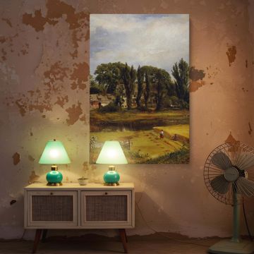 Peaceful landscape painting by Andrew W. Warren printed on canvas, showing a golden harvest field with two women working beside a calm river. Behind them stands a line of tall trees shielding white houses nestled in nature. Painted in natural light and so
