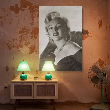 Elegant black and white Marilyn Monroe photo print turned into canvas wall art that celebrates her timeless beauty with a vintage aesthetic ideal for elegant woman decor and old movie star lovers looking to elevate their interior design.