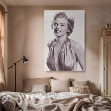 This striking black and white portrait features Marilyn Monroe in a deep halter dress and vintage earrings ideal for elegant canvas art and confident woman photography in retro fashion wall displays.